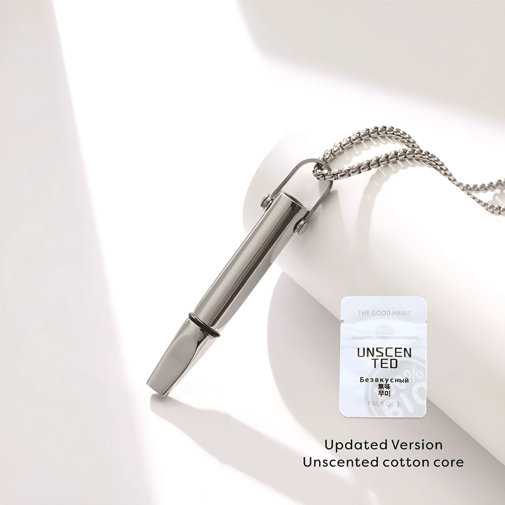 Titanium steel round tube breathing resistance whistle necklace with polished finish on pearl chain