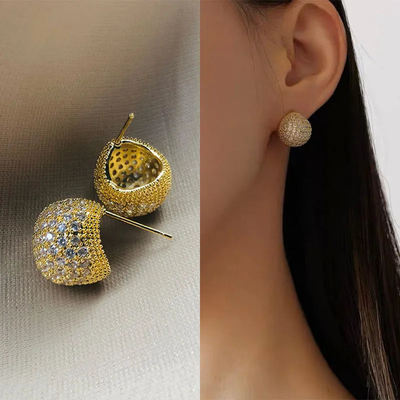 Gold and white drop earrings with geometric sphere design and full diamond little golden beans