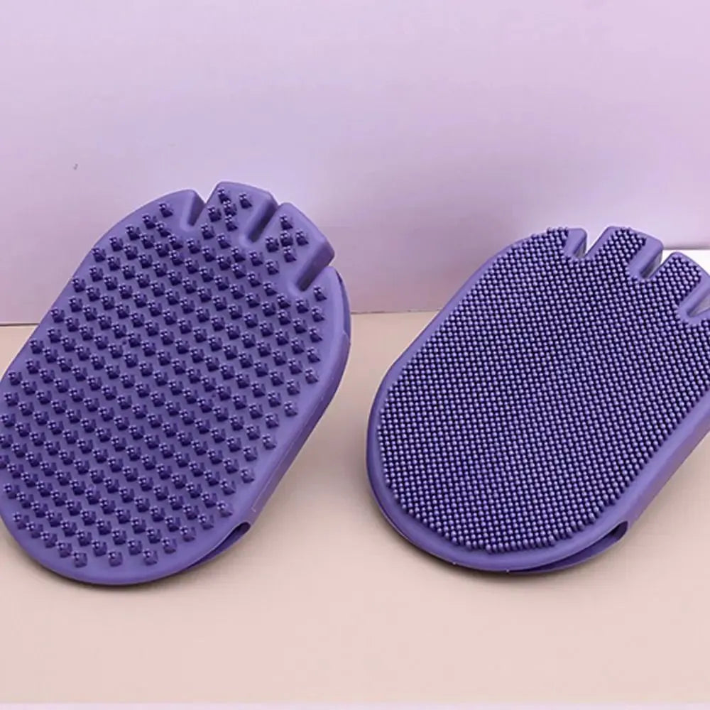 Purple pet grooming brush with soft silicone bristles and ergonomic TPR handle