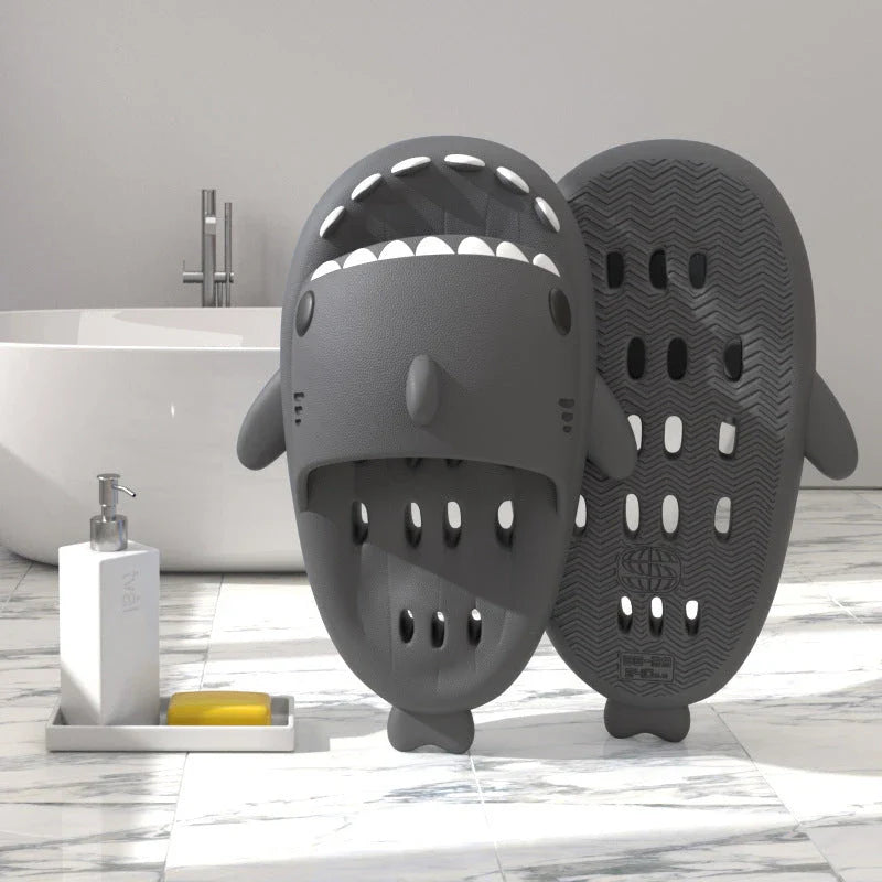 Shark-themed shower slides with drainage holes for women, featuring a realistic design, comfortable EVA material, and anti-slip features.