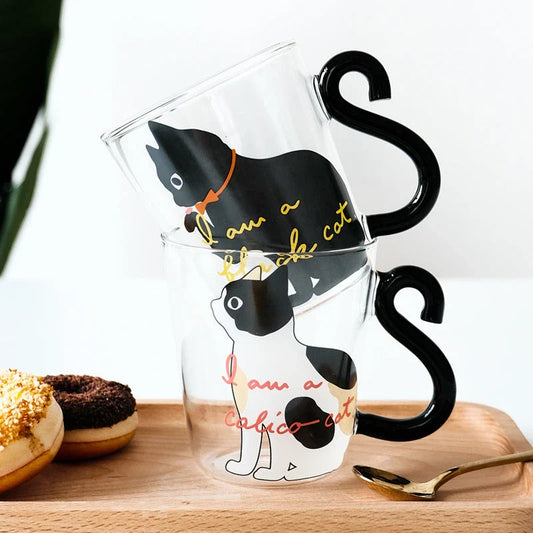 Adorable cat-themed glass mug with tail-shaped handle, perfect for hot and cold beverages