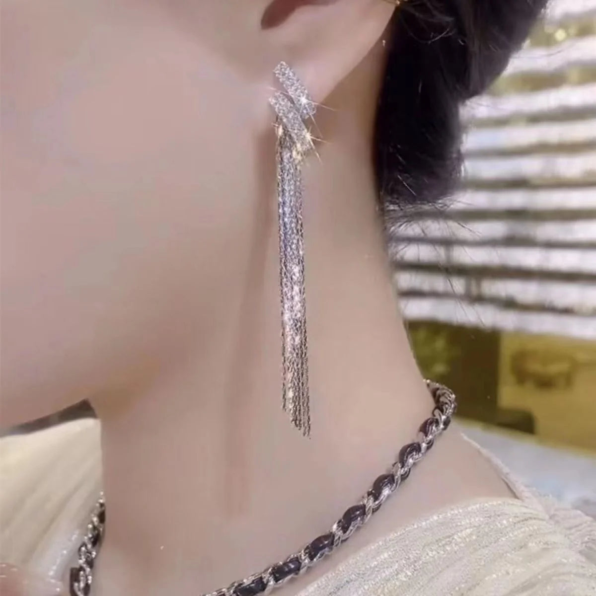 XINGX Water Drop Tassel Earrings in gold alloy with geometric design