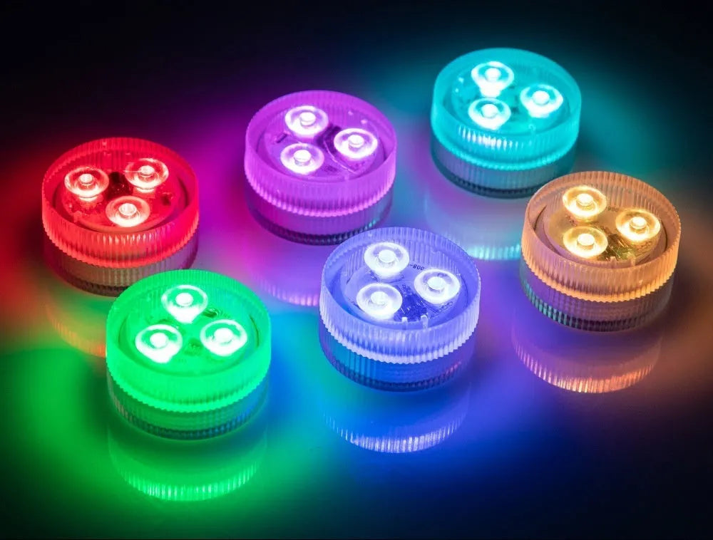 Compact remote control LED diving light for fish tanks with plastic waterproof housing.