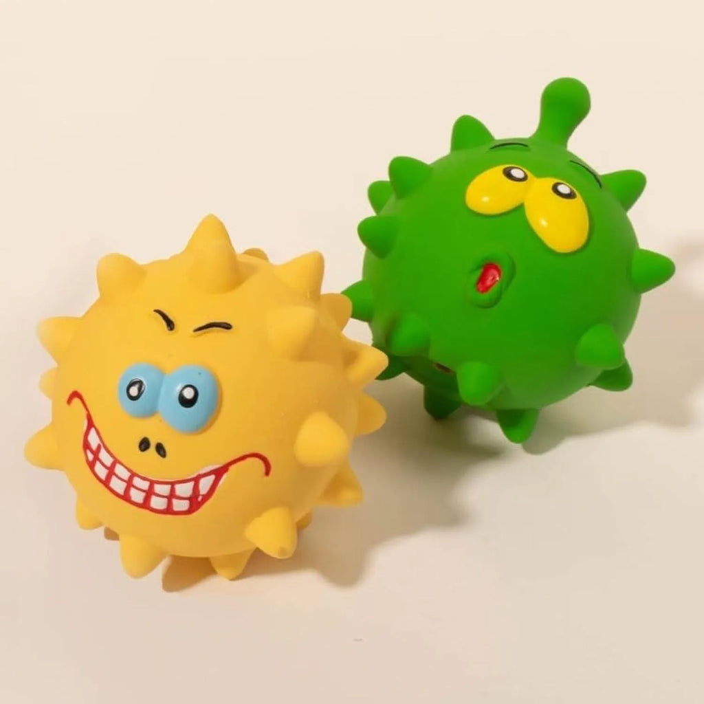 Colourful natural latex squeaky dog ball with cute face and textured surface for teeth cleaning.