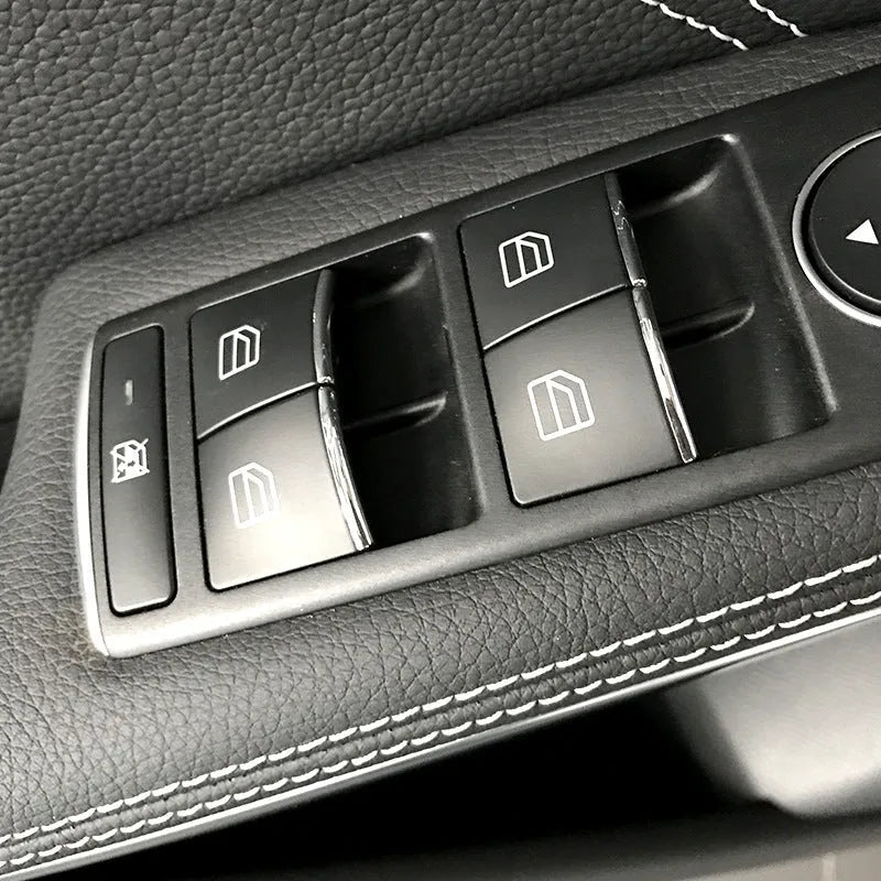 Black glitter decorative sticker for a car window switch button on a white background.