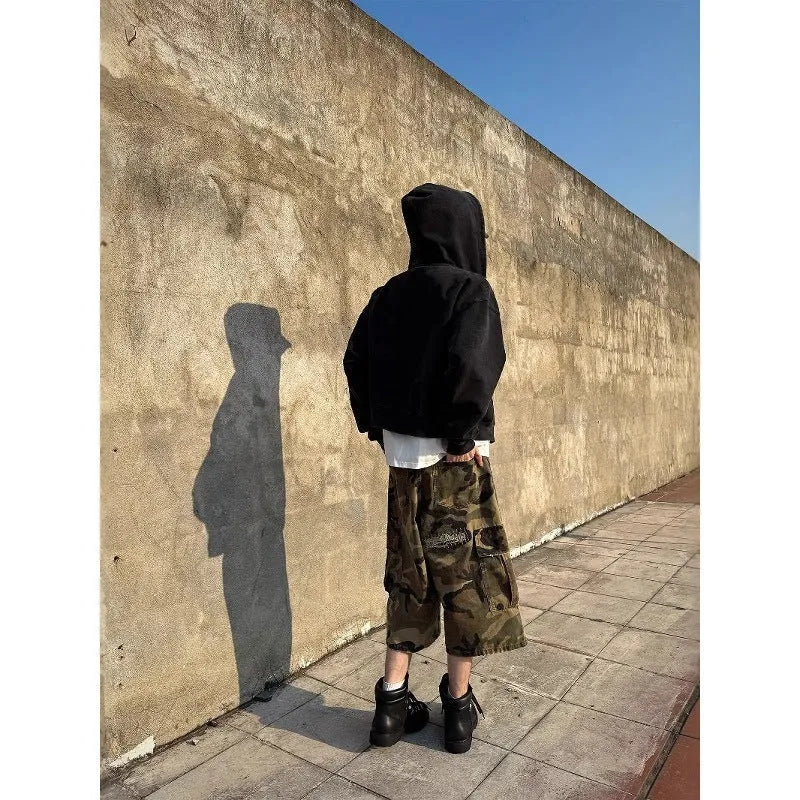 Men's camouflage coloured cropped jeans with ripped detailing and straight leg loose fit