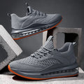 Men's black mesh running shoes with rubber sole and lace-up design for sports