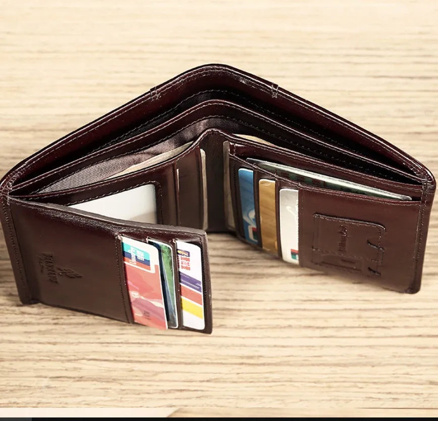 Men's leather wallet showing internal compartments including photo window, card slots and coin pouch