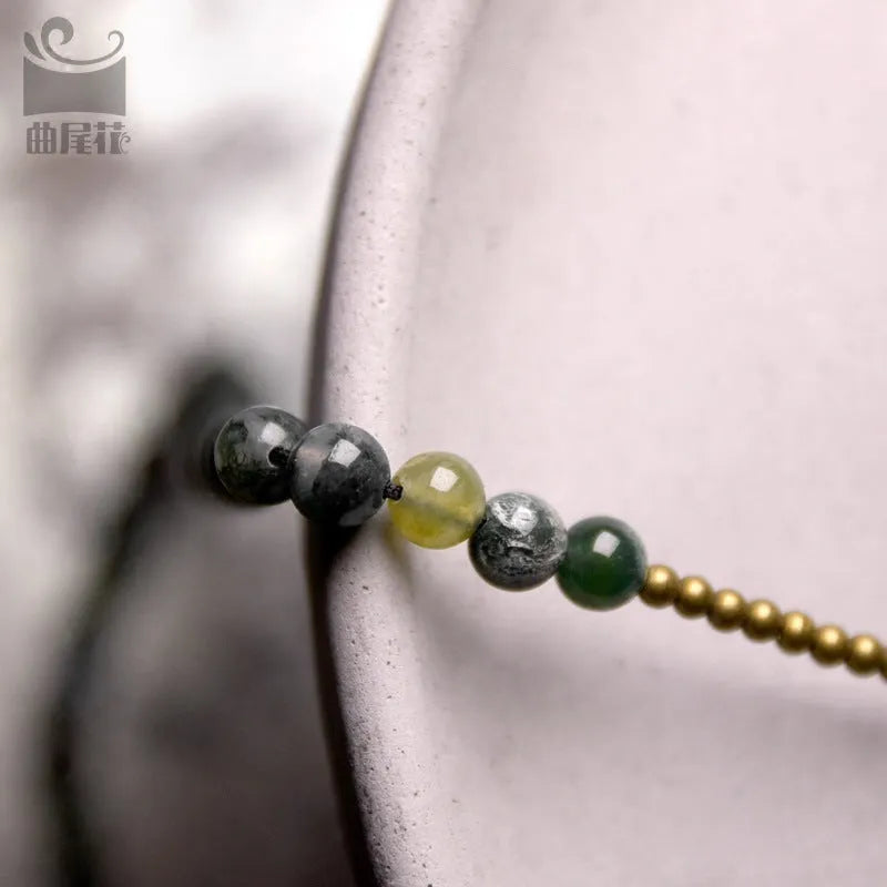 Handmade layered children's bracelet in ethnic retro style with natural crystal stones