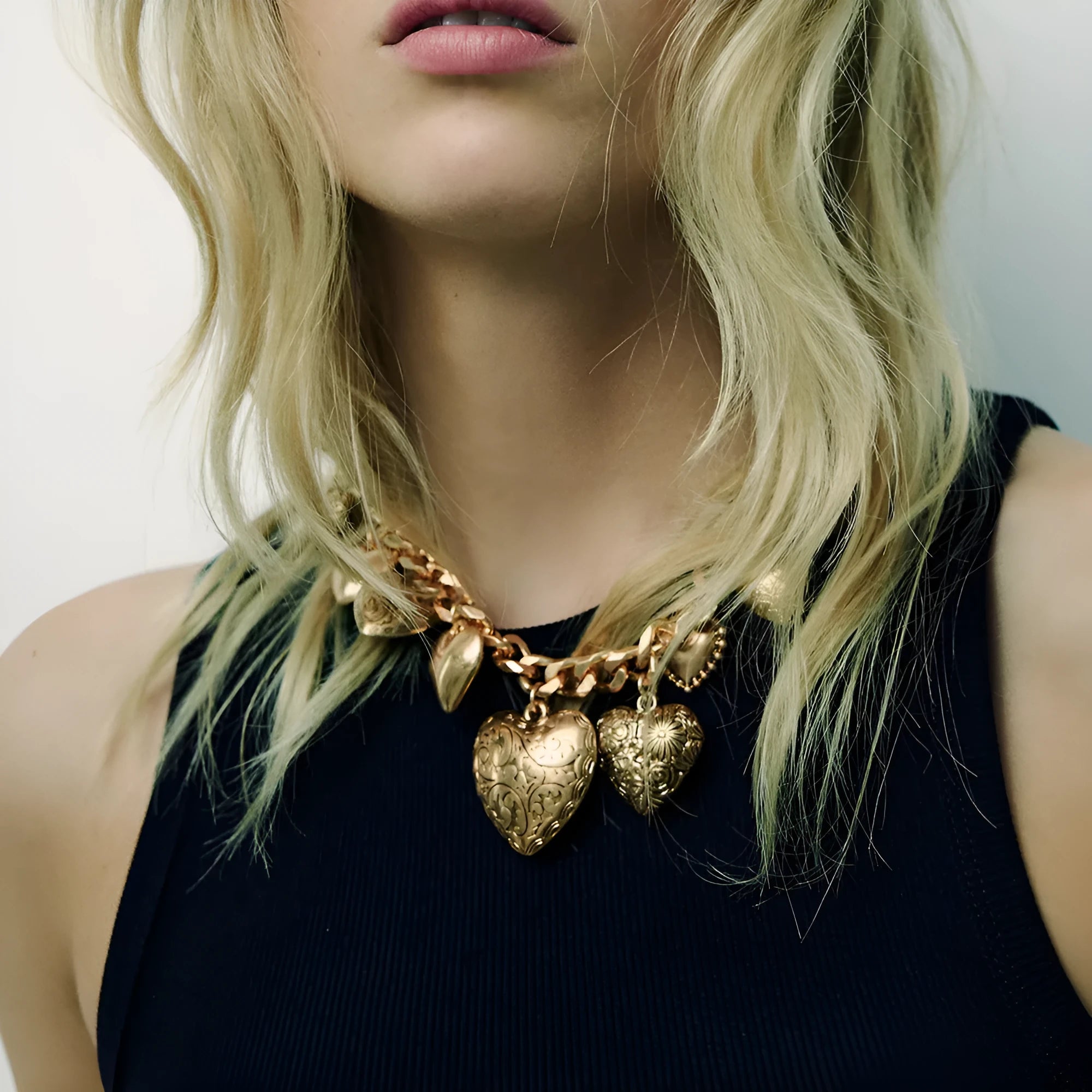 Carved heart pendant necklace with adjustable chain in exaggerated luxury style