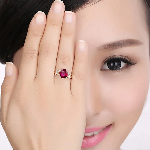 Women's butterfly ring with heart-shaped design and red or blue enamel options on rose gold plating