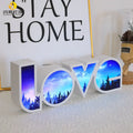 Rainbow halo style LED LOVE light sign measuring 35.5 x 13.5 cm for Valentine's Day decoration