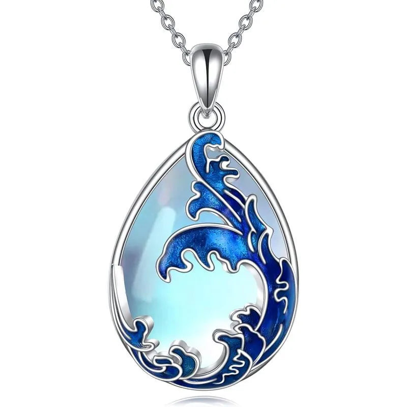 Moonstone blue alloy heart pendant on a women's necklace.