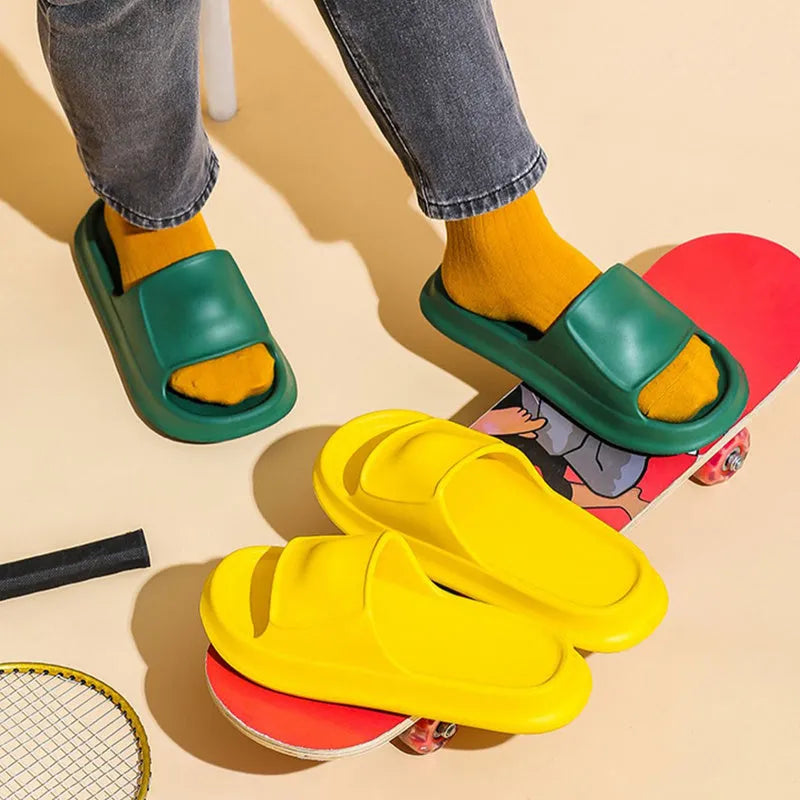 A pair of thick-soled EVA flip-flop slippers for men and women in a choice of seven colours.