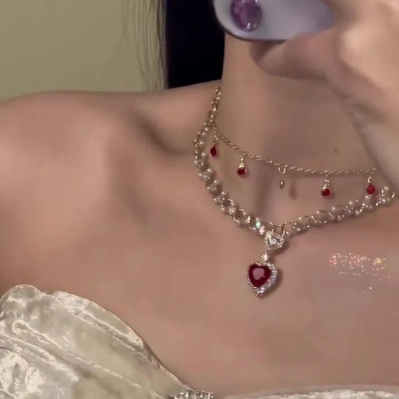 Red double layer necklace with heart pendant on adjustable alloy chain