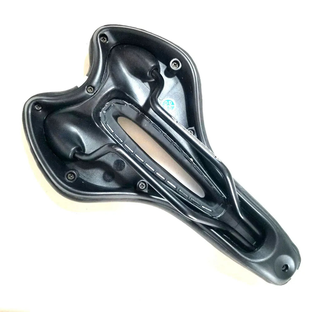 Bicycle saddle cushion with soft silicone top, PU leather cover, and included wrench and repair kit.