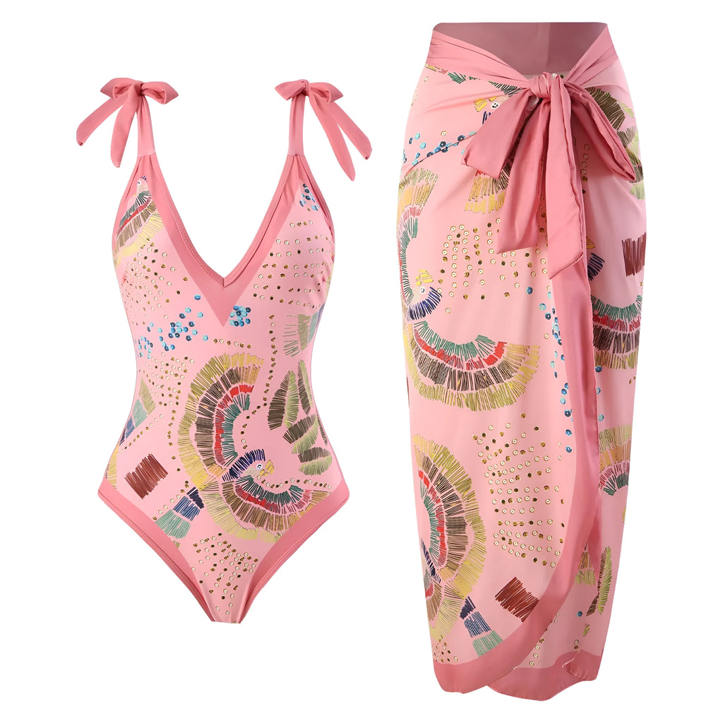 French retro blue one-piece swimsuit with gauze skirt on beach