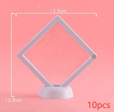 3D floating jewelry display stand showcasing earrings and coins in mid-air