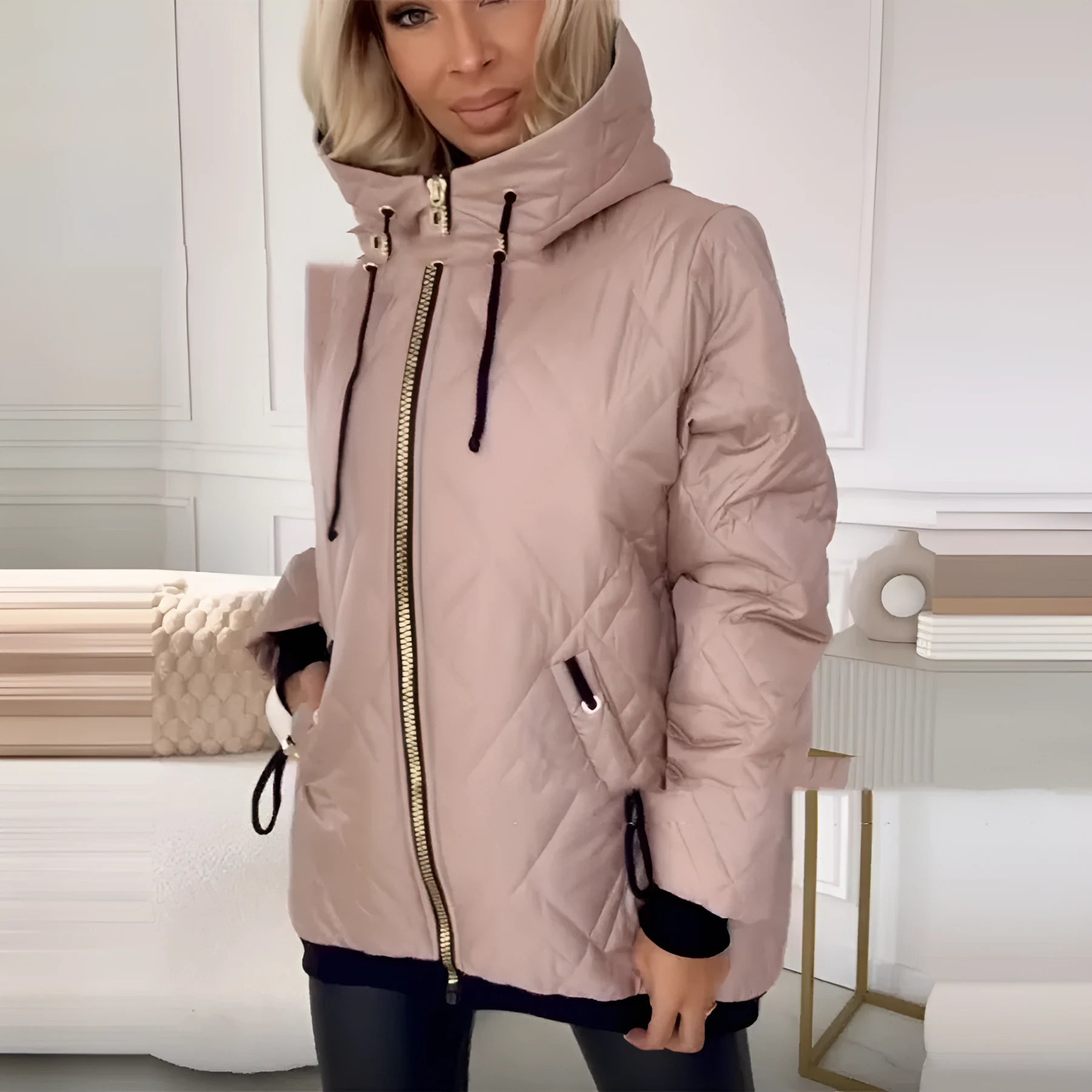 Women's pink hooded polyester coat with regular long sleeves showing front view
