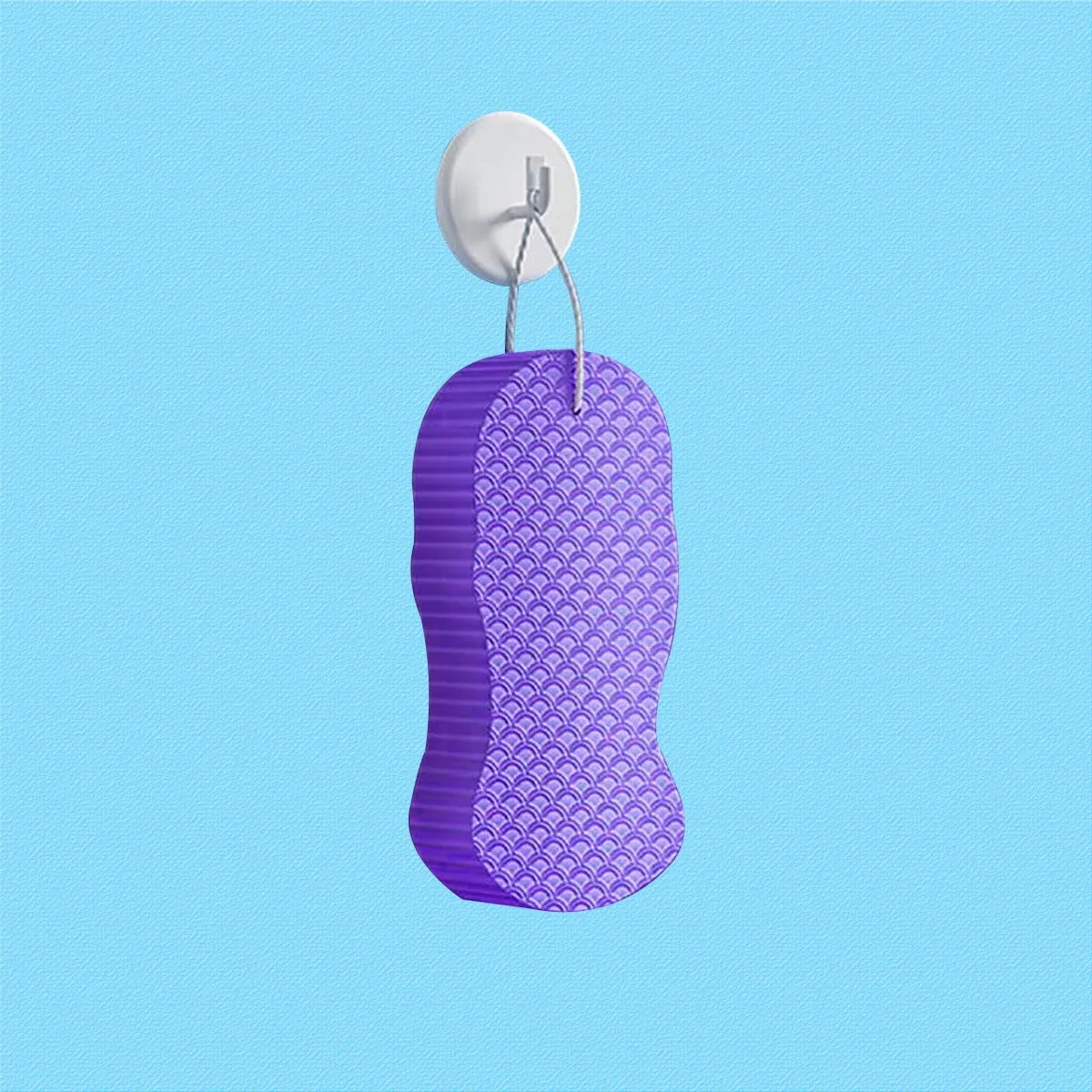 White 3D fish scale pattern bath sponge ball on a bathroom surface.