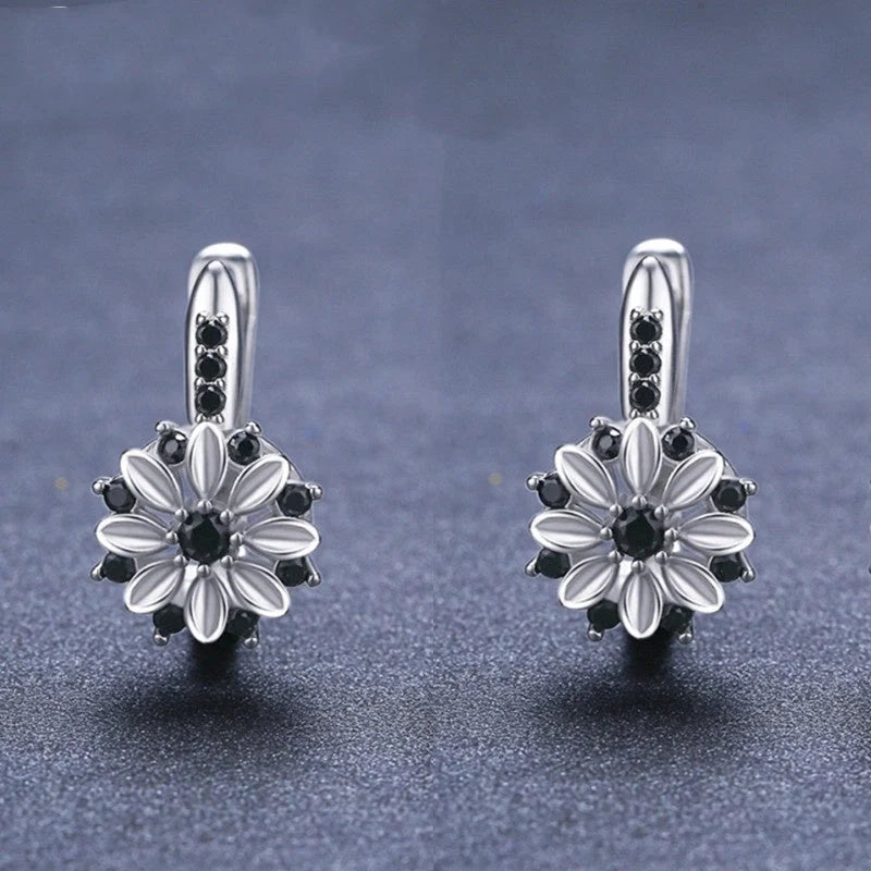 Copper inlaid zircon flower ear clips for women, black floral design