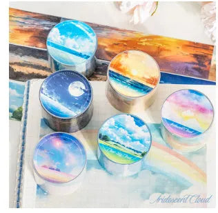 Japanese paper washi tape roll with sky theme designs including clouds, sun, moon, and nebula patterns
