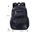 Primary school backpack in royal blue with nylon material, letter print pattern, and side opening