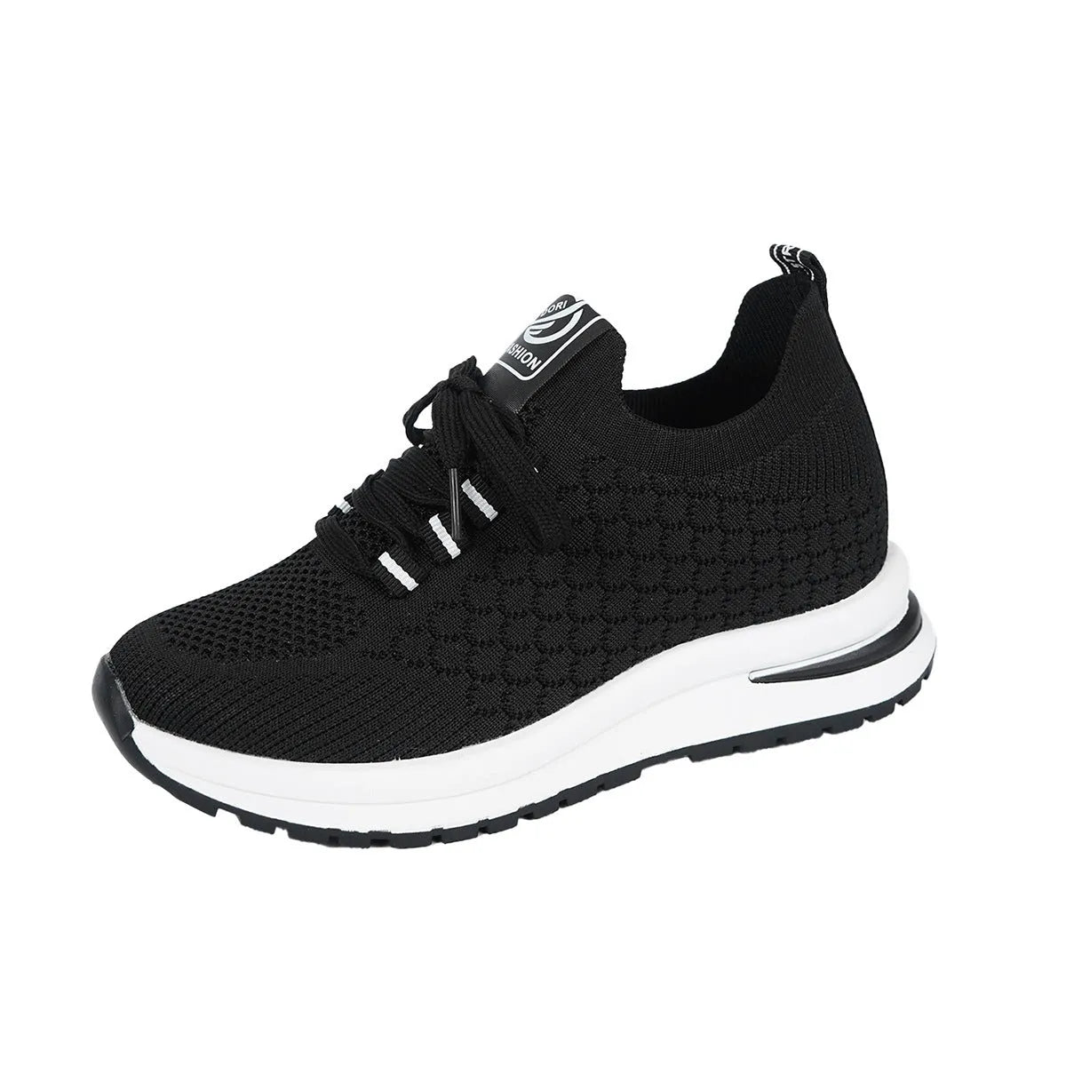 Women's black and white lace-up sneakers with mesh upper and flat rubber sole on a white background.