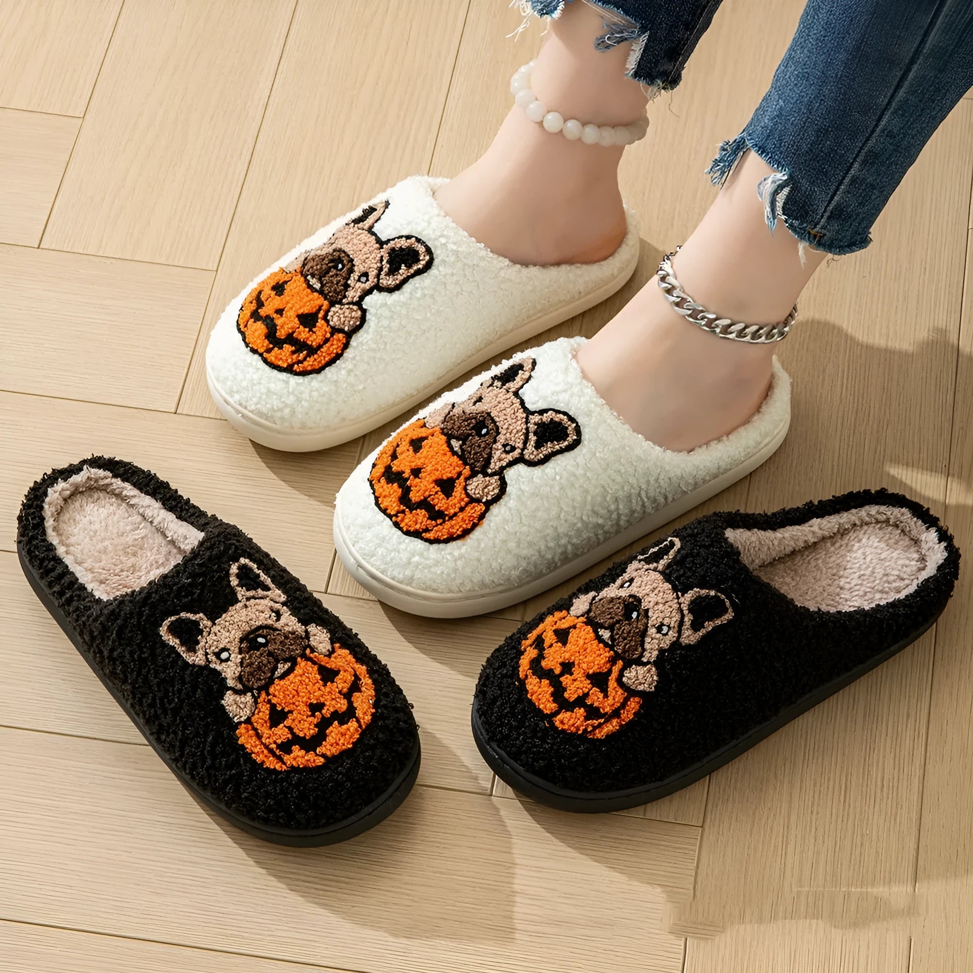 Halloween pumpkin slippers with plush upper and TPR rubber soles in black and white colours