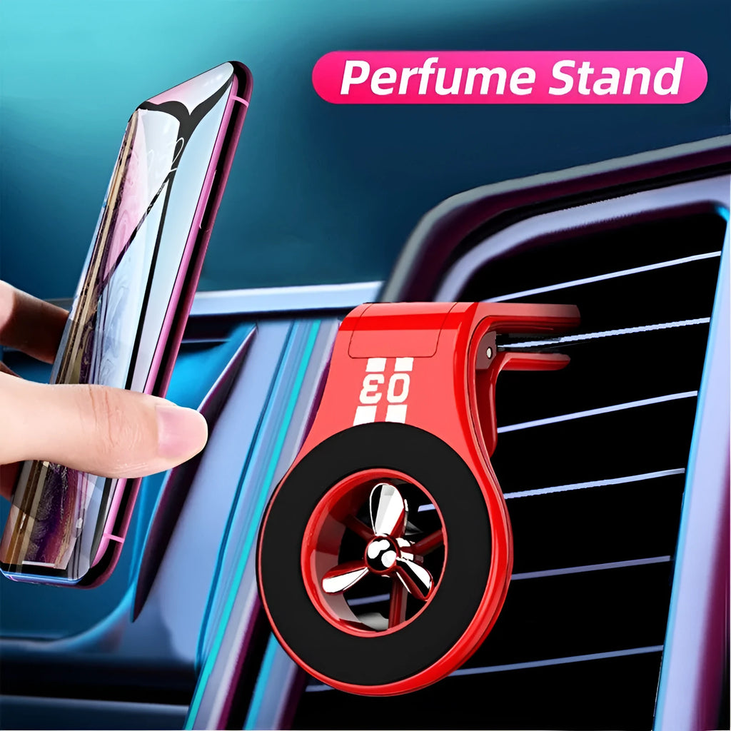 Magnetic car phone holder mounted on air vent with smartphone attached and fragrance slices