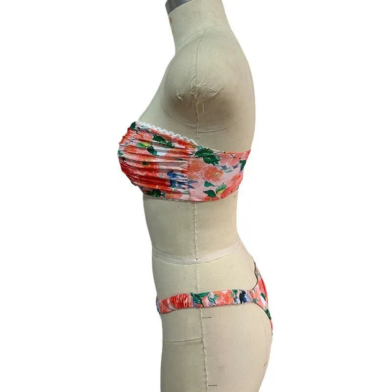 Blue floral print women's bikini set with lace trim on sleeveless tube top and matching briefs.