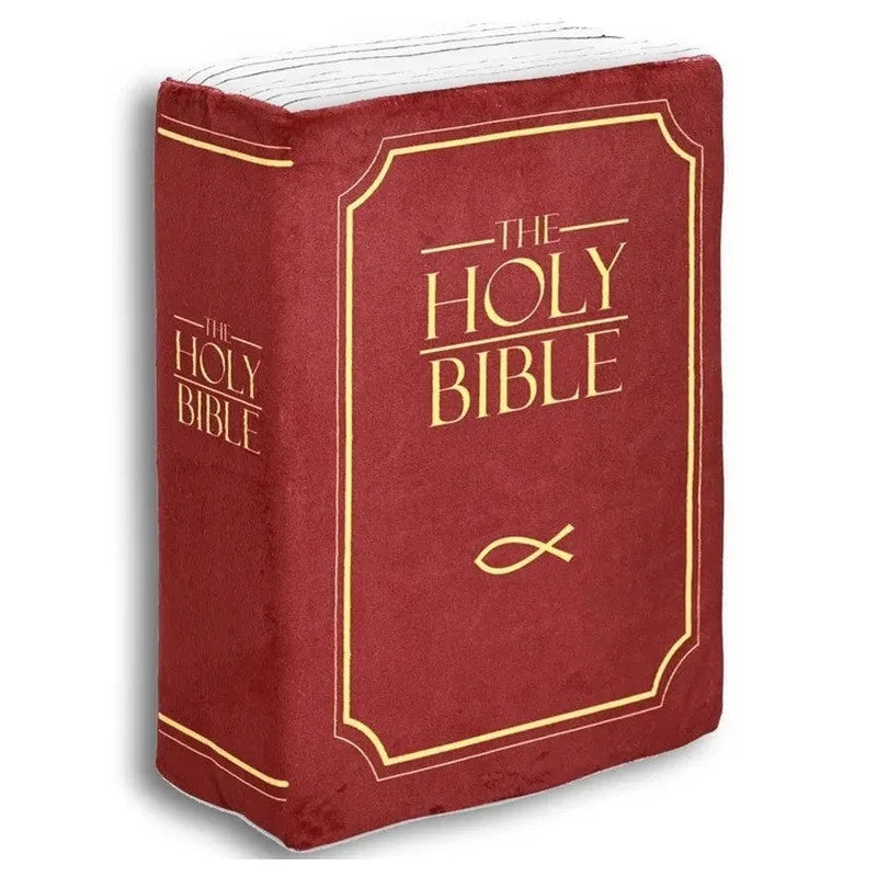 Solid-colour Christmas bible plush toy doll pillow on a chair.