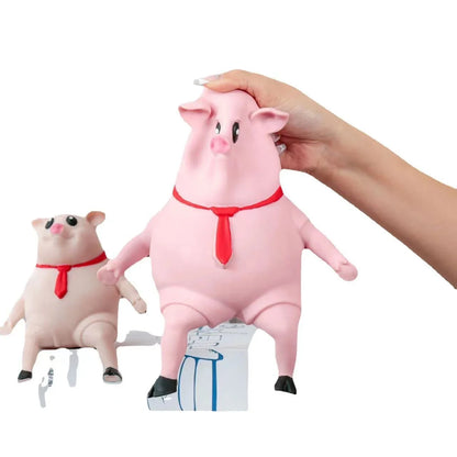 Piggy-shaped stress relief toys made from soft, eco-friendly rubber with cute scarf accents