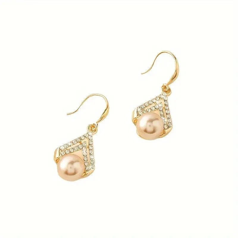 Water Drop Pearl Earrings in gold, white, and champagne with geometric design