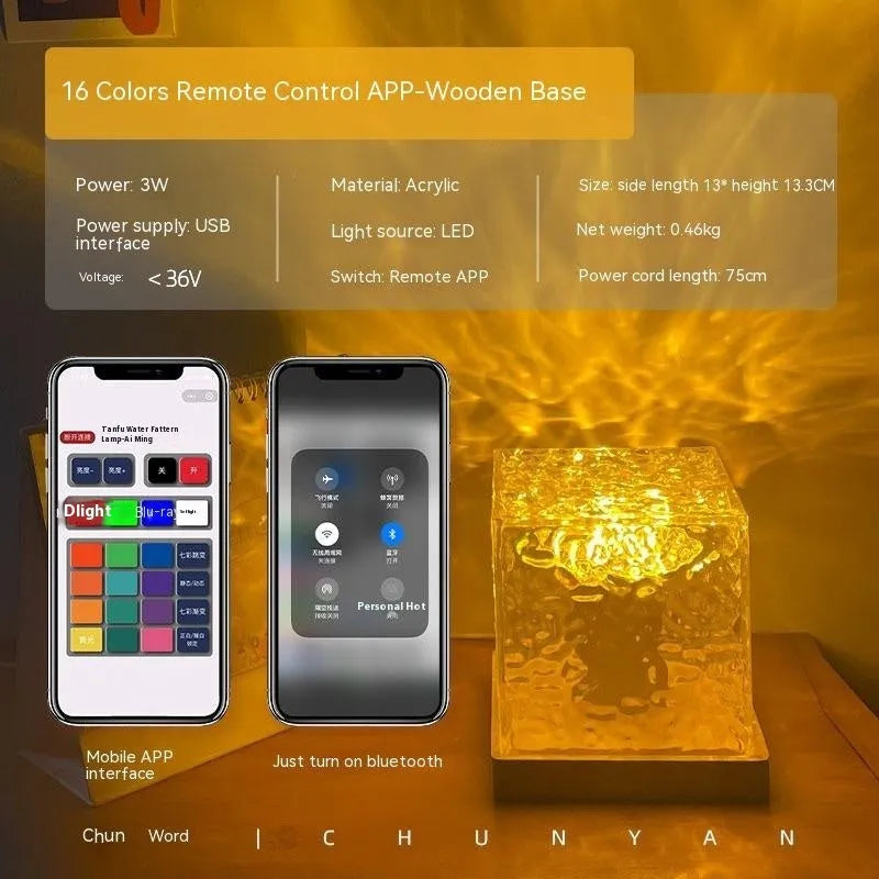 LED water ripple projection night light with remote control on wooden surface