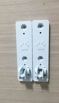 Stainless steel cat window hammock with suction cups attached to glass