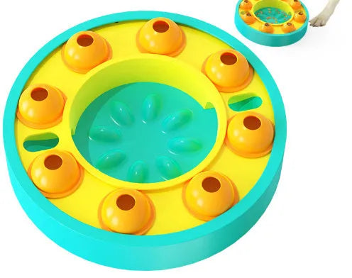 Square green dog puzzle feeder bowl with rotating turntable top and non-slip rubber base.