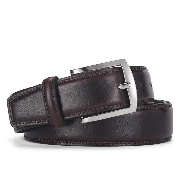 Men's black genuine leather belt with a silver pin buckle shown on a flat surface