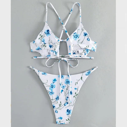 Women's floral pattern tie-neck triangle swimsuit with matching shorts on mannequin