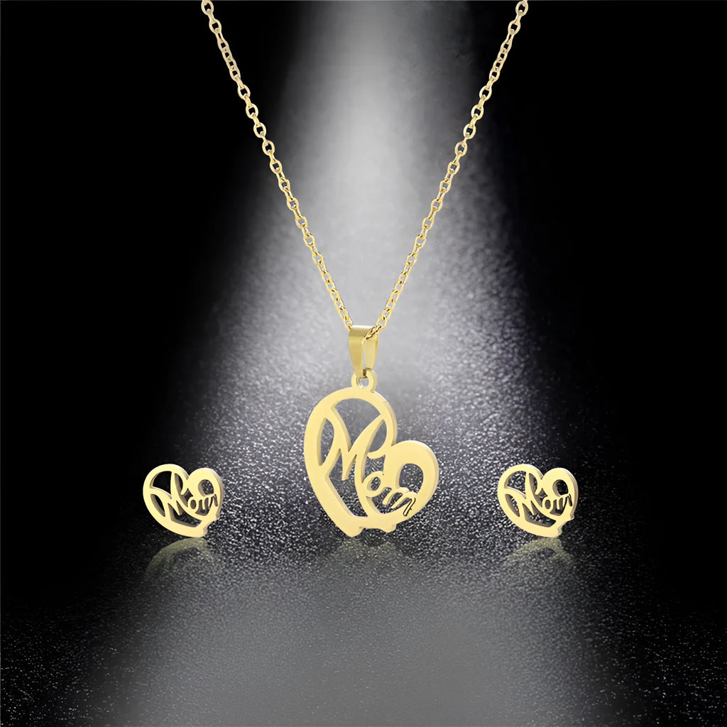 Stainless steel heart-shaped mom necklace and earring set in TZ-216 gold finish on display