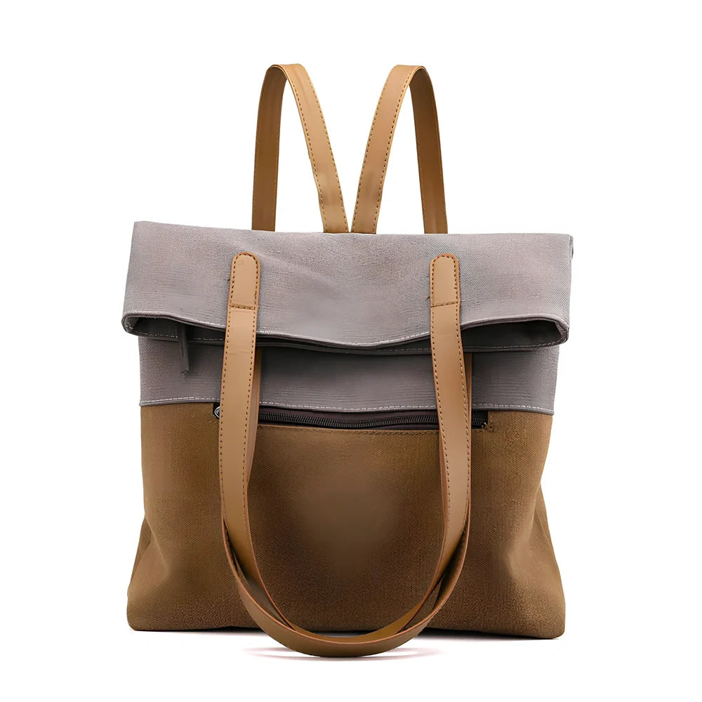 Canvas tote bag in black converts to backpack, 30x10x39cm size with zipper and polyester lining