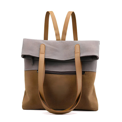 Canvas tote bag in black converts to backpack, 30x10x39cm size with zipper and polyester lining