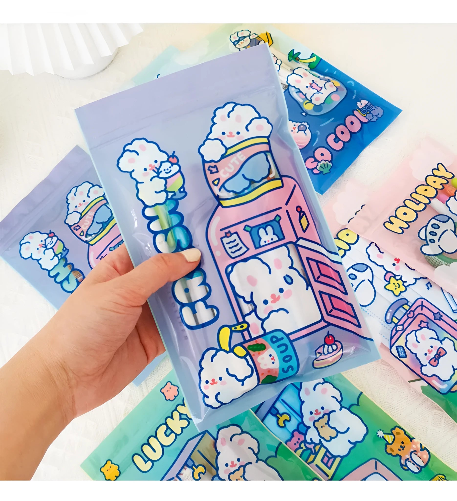 Green, blue, purple and pink rectangle packaging bags with cute rabbit designs for snacks and gifts.