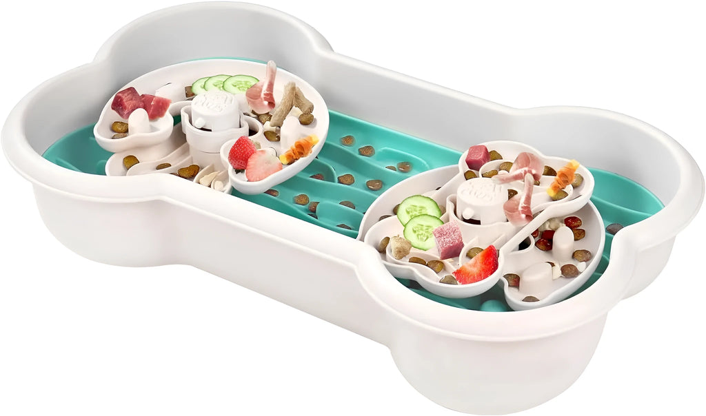 Large green slow feeder dog bowl with three rotating puzzle trays and anti-slip suction cups on base.