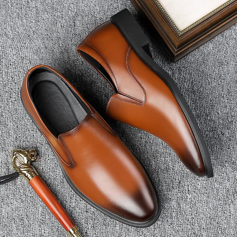Men's black slip-on business casual loafers with leather toe cap and rubber sole