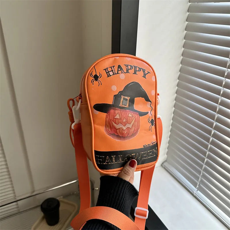 Halloween-themed crossbody phone bag with cartoon pumpkin, ghost, and bat print.