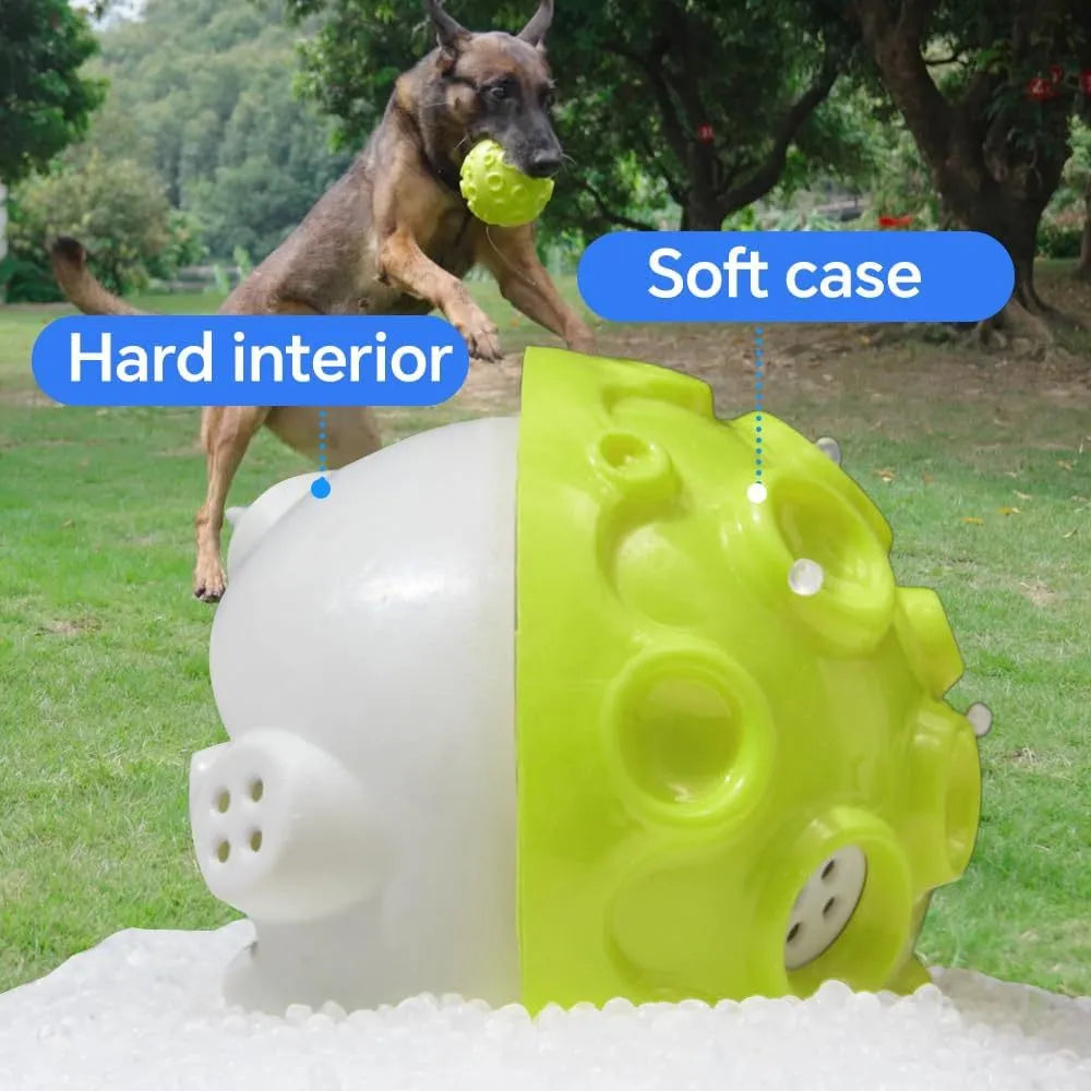 Coloured rubber dog toy ball with a bumpy surface for aggressive chewers and teeth cleaning.