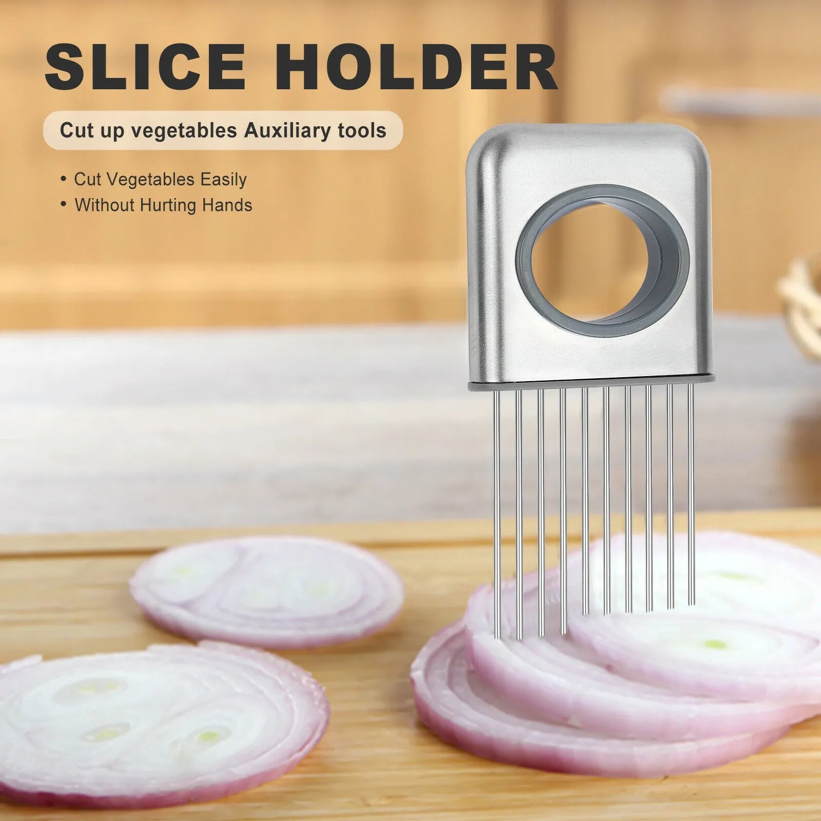 Stainless steel onion holder with sharp prongs and a finger guard on a kitchen counter.