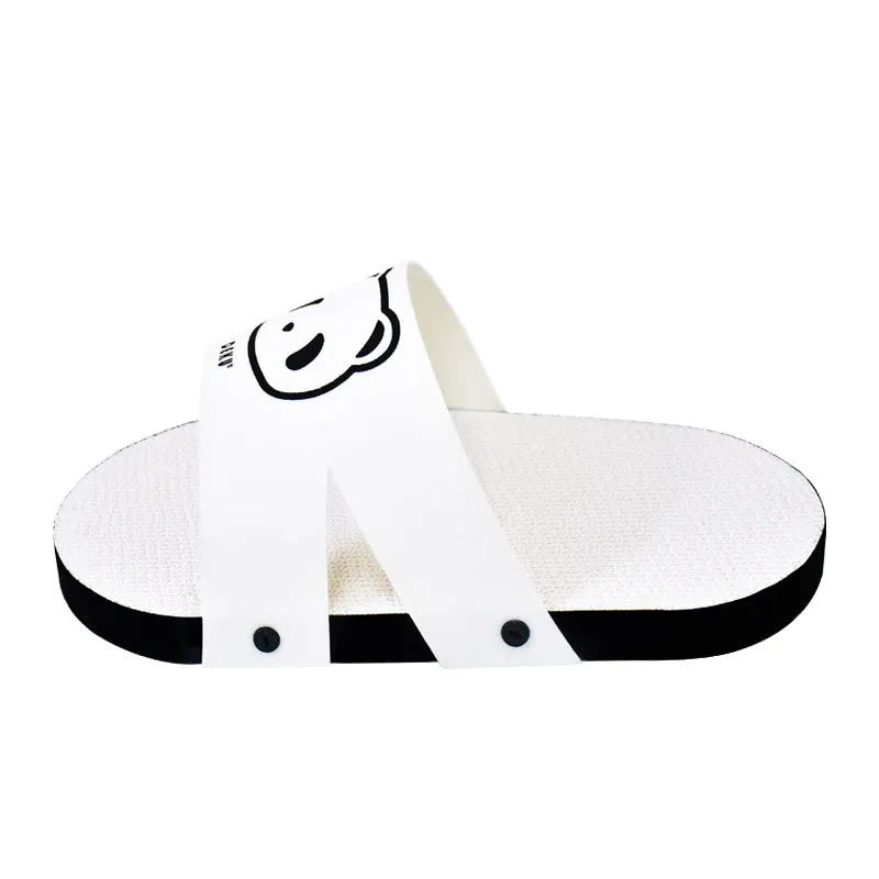 White slipper-shaped cat scratch board made from corrugated paper.