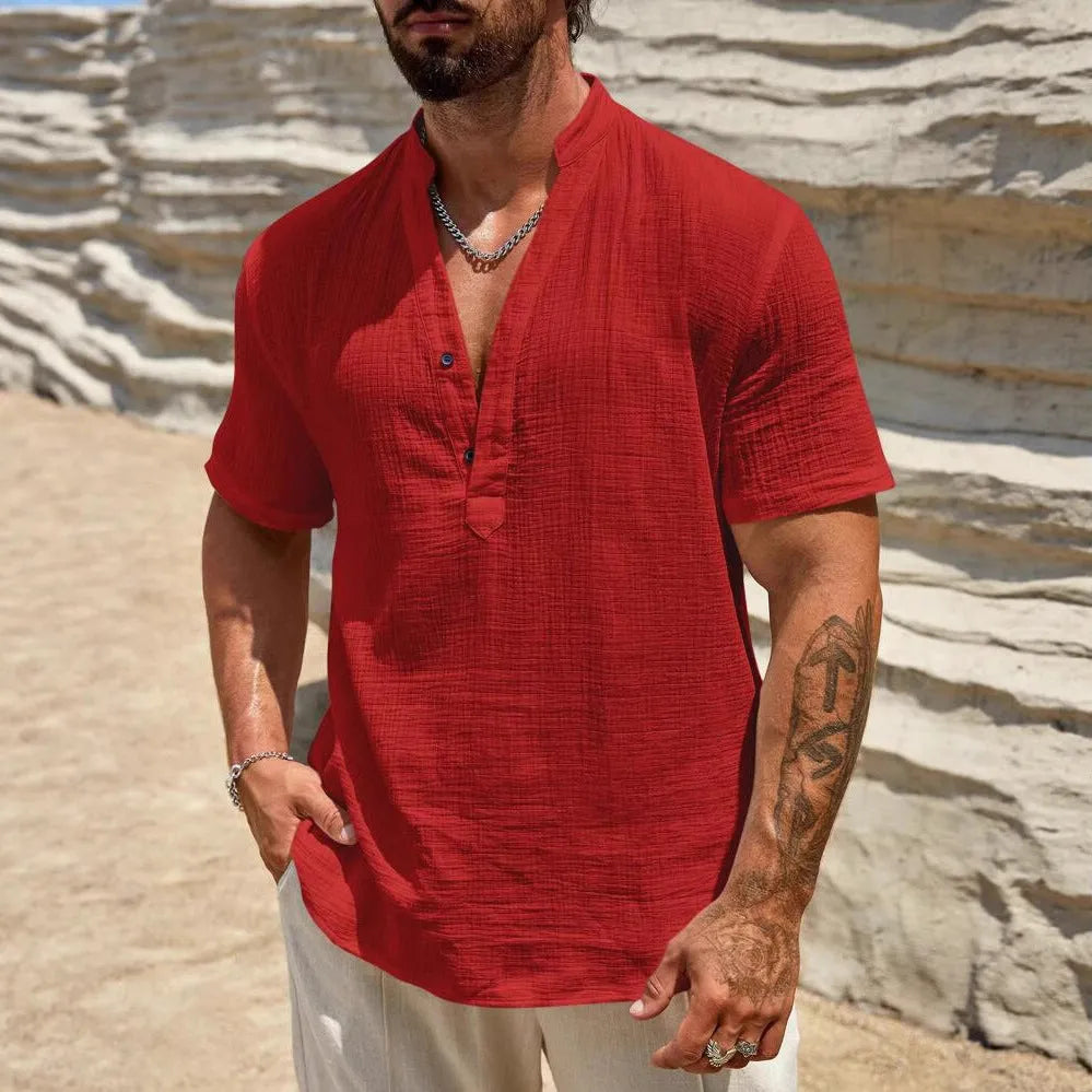 Men's solid colour short-sleeved shirt with a stand collar on a hanger.